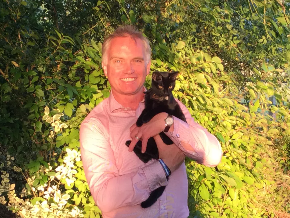 Trustee Jeremy Stewart and cat Thing 1
