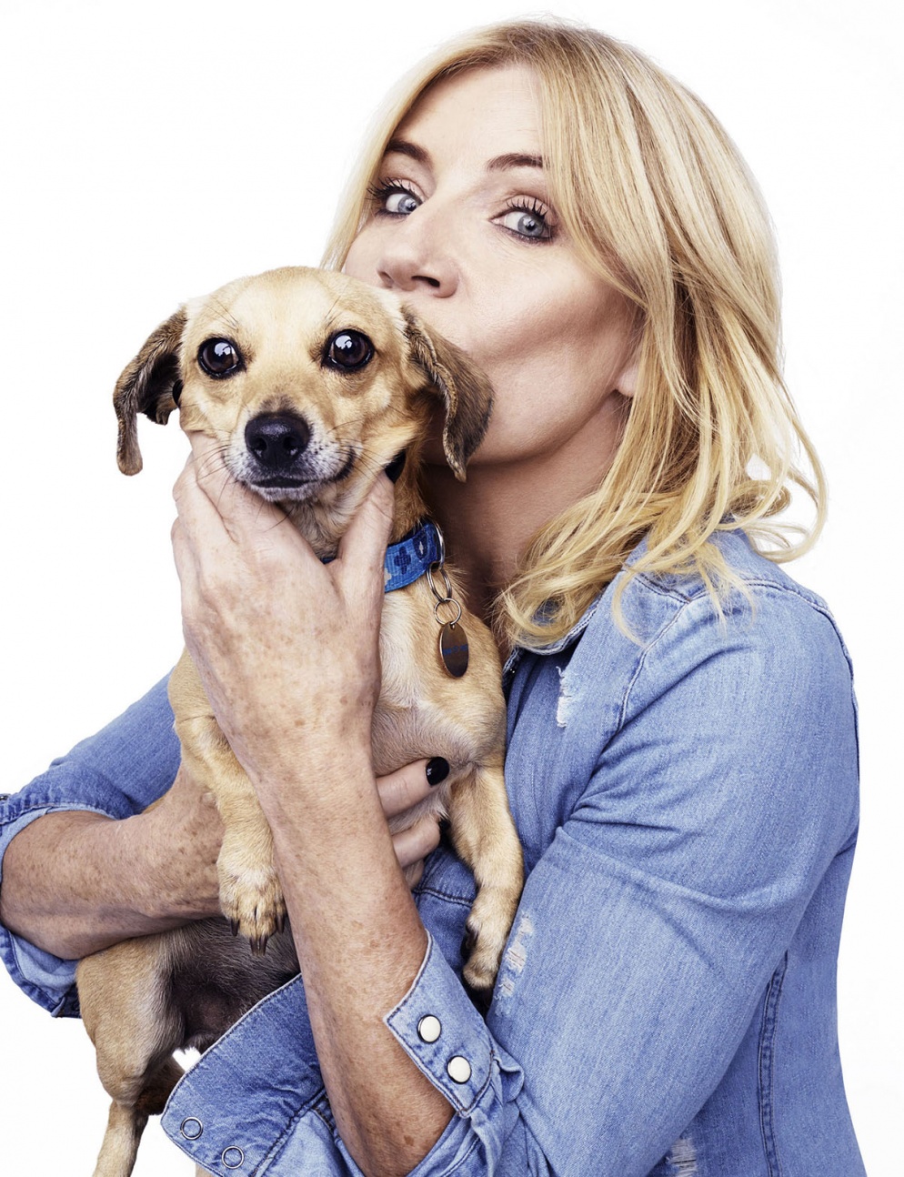 Actor Michelle Collins is snapped with Blue Cross rescue dog, Stitch: “I just love having a dog and you get so attached to them. It becomes such a way of life and he such a big part of our family. I can’t imagine what my life would be like without Humphrey.” Photo by Rankin.