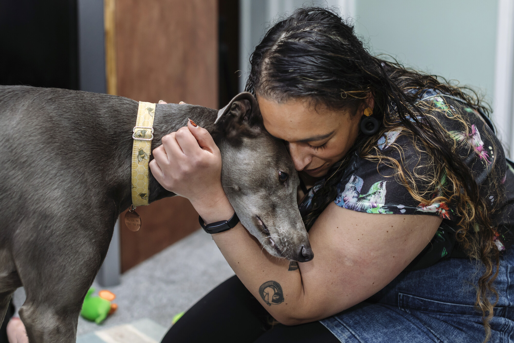 Bleu being hugged by Amy