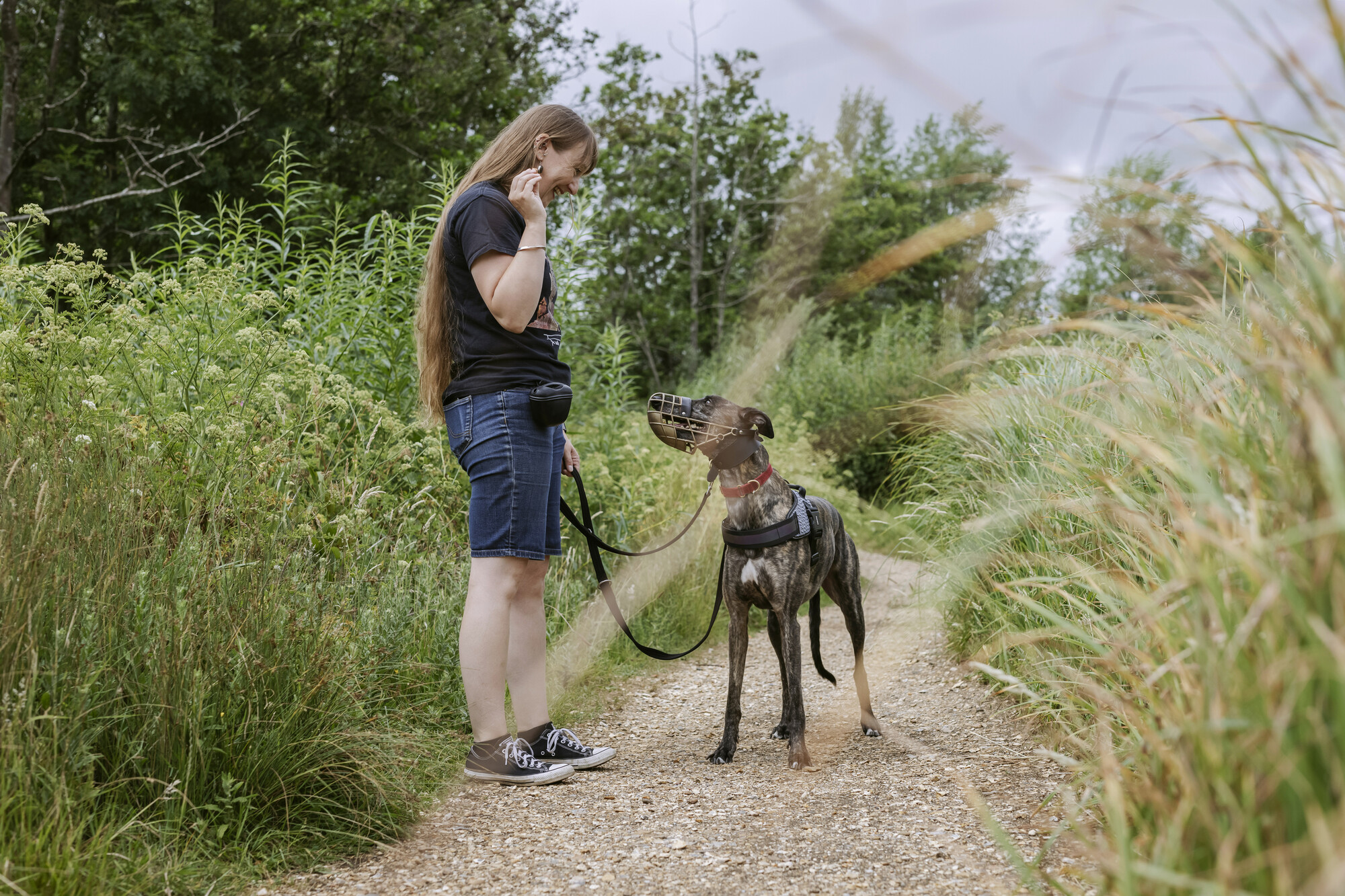 On a walk, Amos looks at Kit as she says "on me"