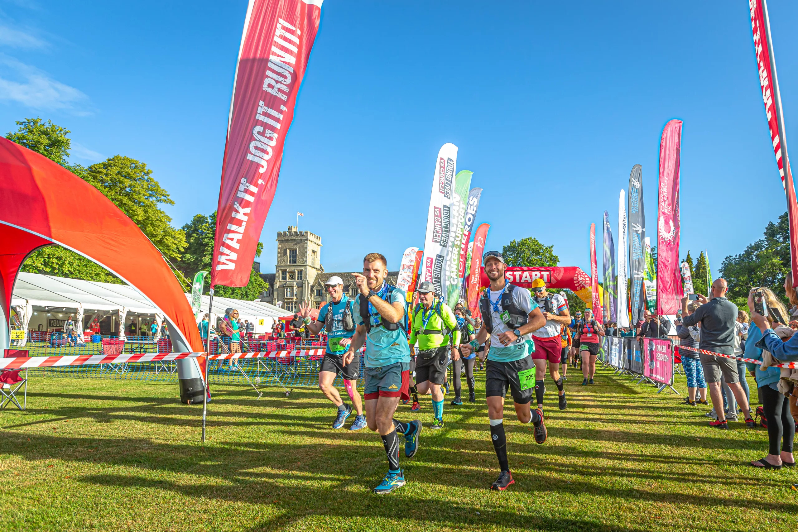 a group of people running to raise money as part of the Cotswold Way Ultra Challenge 