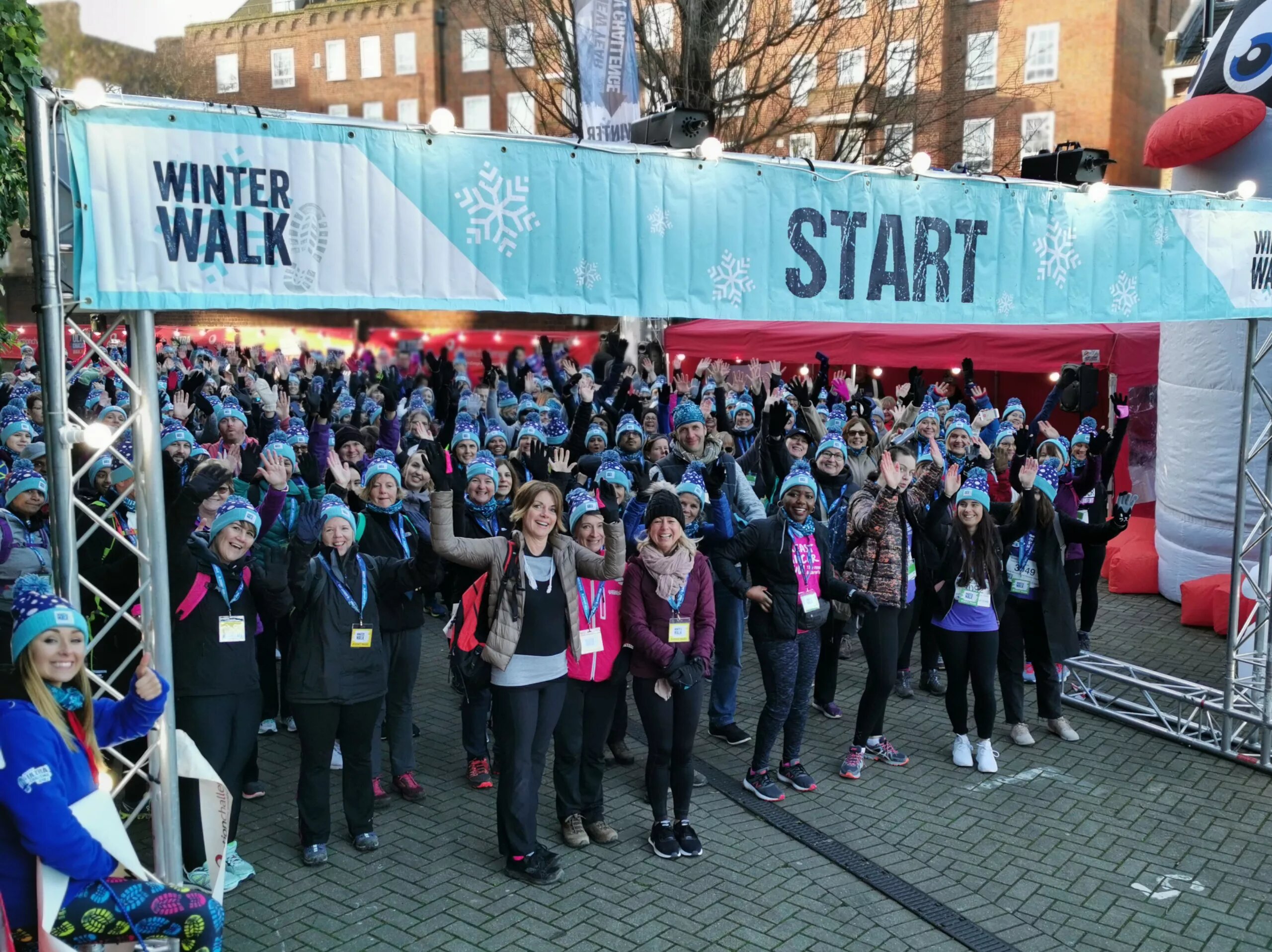 A group of people at the starting line of London Winter Walk.