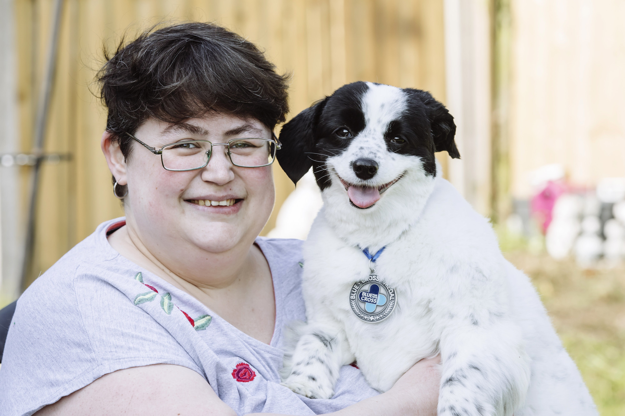 Lily-Rose with owner Jenny wearing her medal.