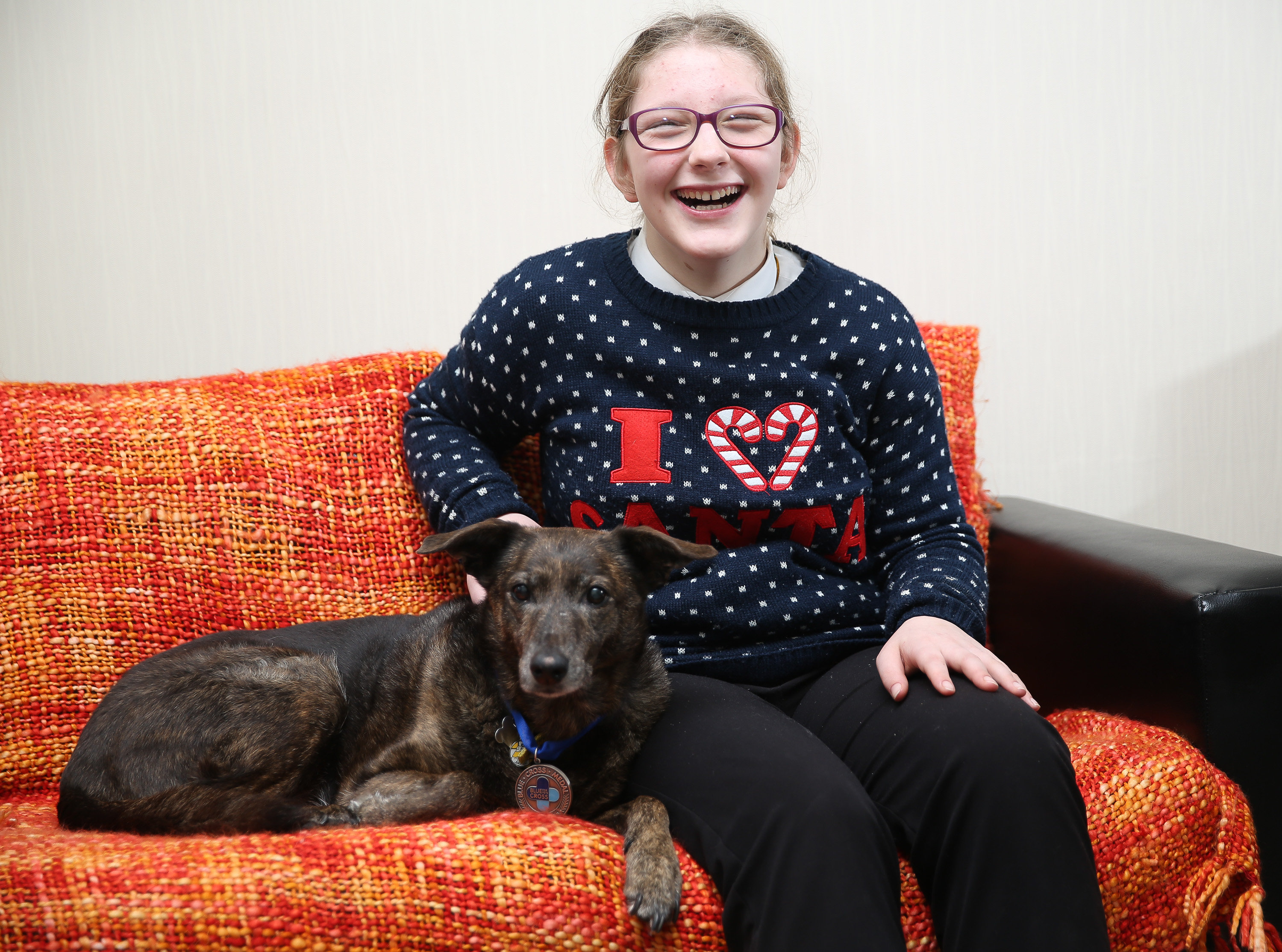Bonnie gets a pat on the back from Kate Bentham, who is no longer afraid of dogs thanks to her canine friend