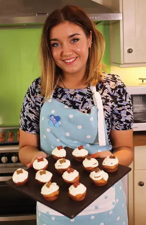 Sarah McCready holding pupcakes