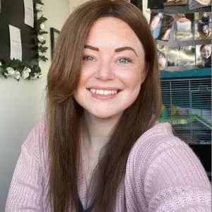 Brown haired woman smiling