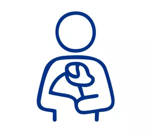 An illustration of a person holding a dog.