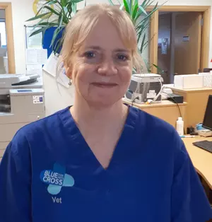 Alison Thomas - Head of Veterinary Services in Blue Cross uniform