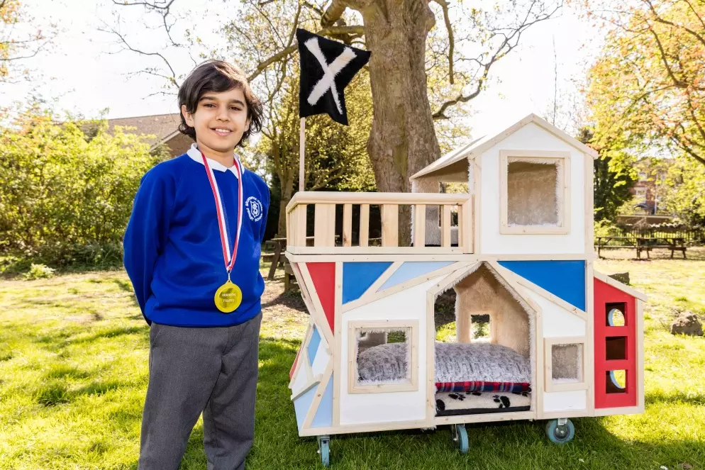 Brandon with his winning dog house design