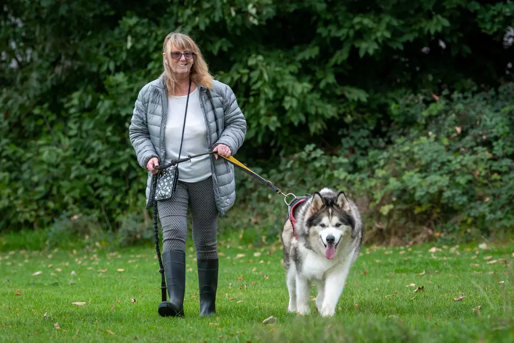 Karen out on a walk with her medal-winning dog Storm