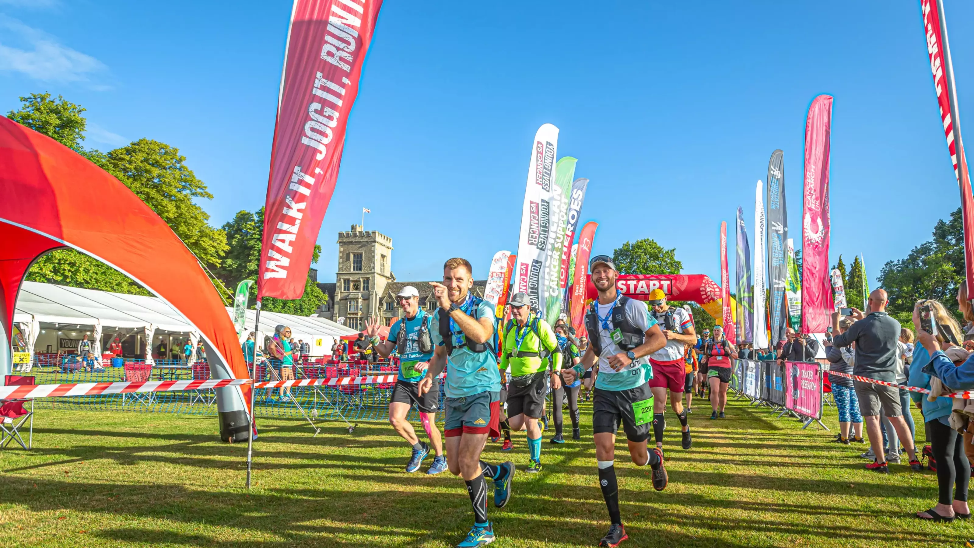 a group of people running to raise money as part of the Cotswold Way Ultra Challenge