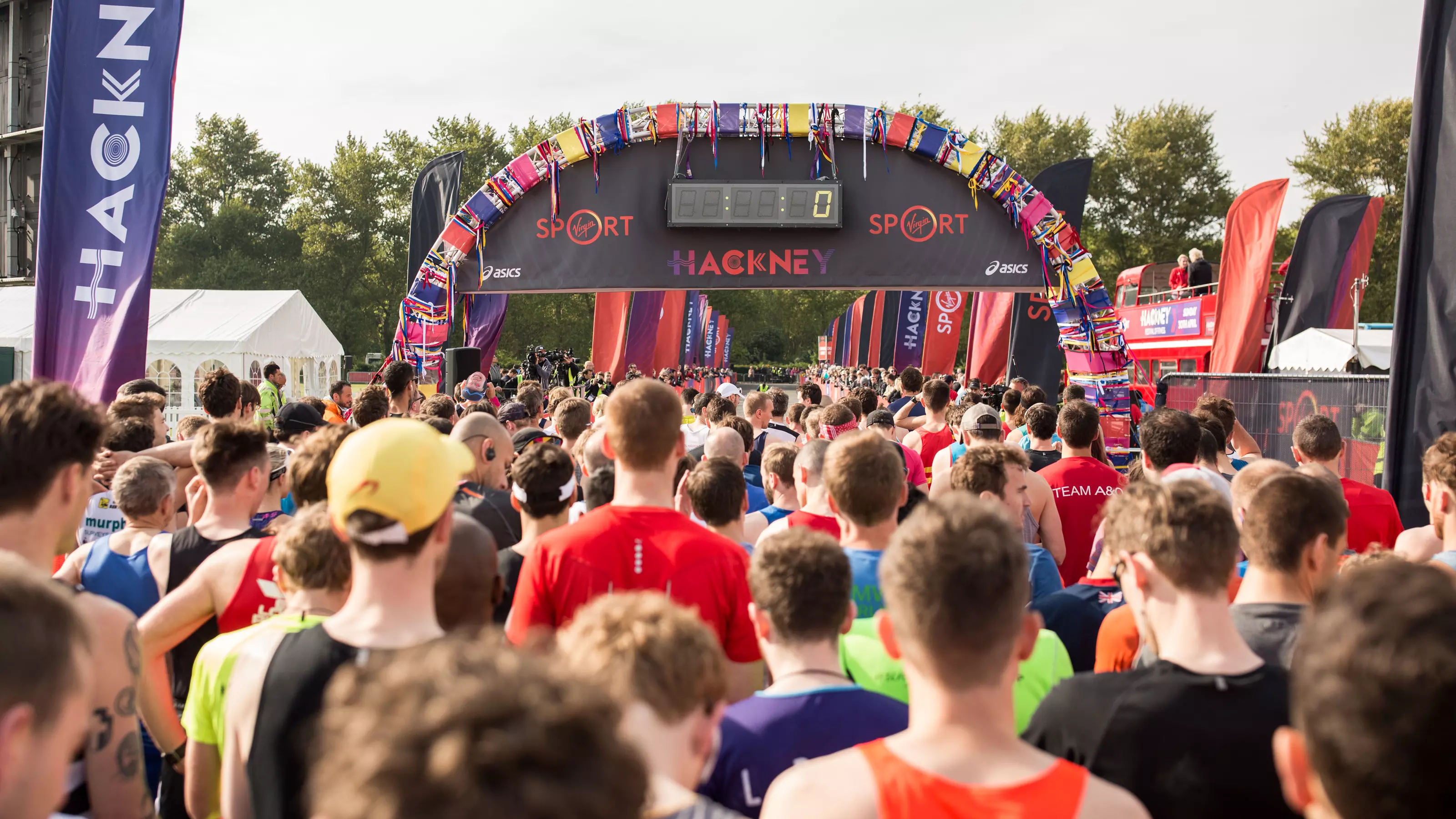 A group of marathon runners taking part in the Hackney Half marathon