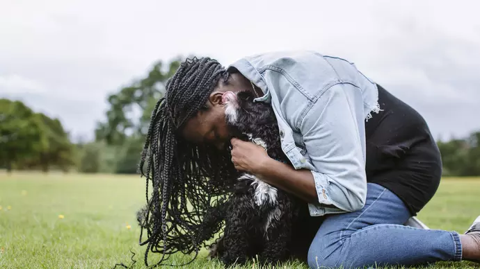 Katherine giving Benji a hug