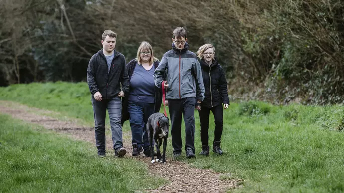 Lucie out on a walk with her new family