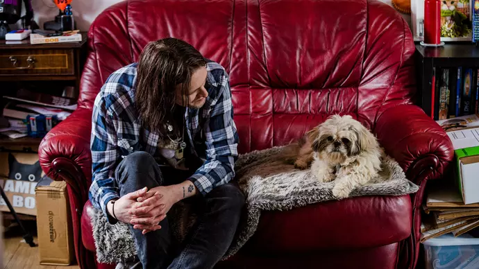 James and Chewbie sat together on sofa