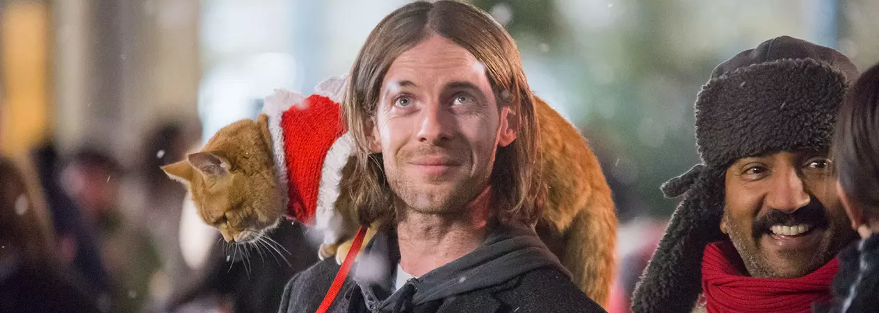 Luke Treadaway and the cat playing Bob in the new film 