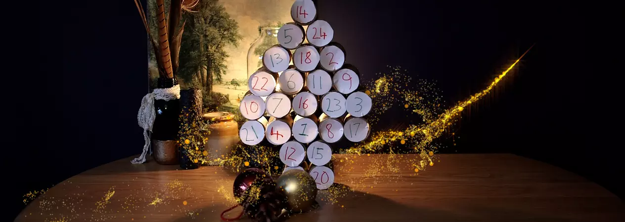 A Christmas tree made of toilet rolls, decorated with the numbers one to 24