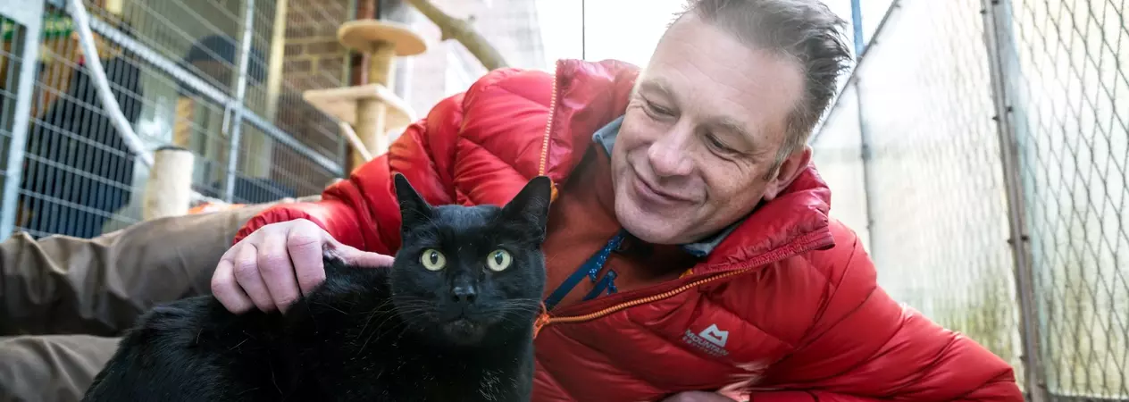 Chris Packham with black cat