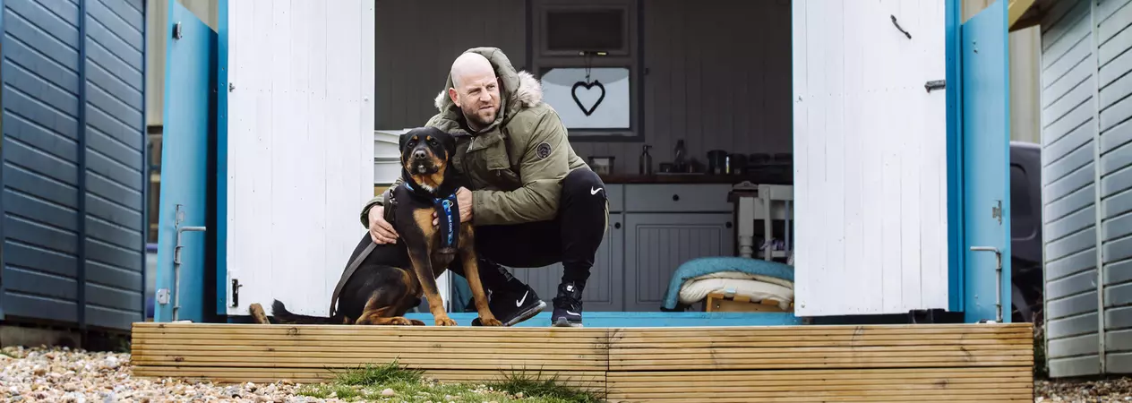 Kaiser and Ross at their beach hut in Hastings